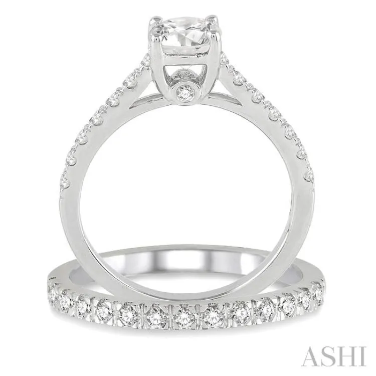 1 1/10 Ctw Diamond Wedding Set with 3/4 Ctw Round Cut Engagement Ring and 1/3 Ctw Wedding Band in 14K White Gold