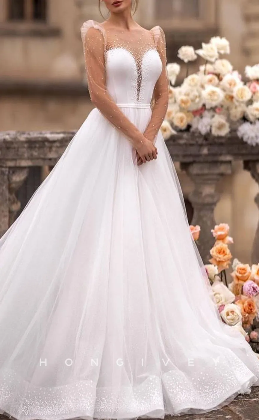 H1258 - Sexy Tulle A-Line Scoop Long Sleeve Empire Beaded With Train Wedding Dress