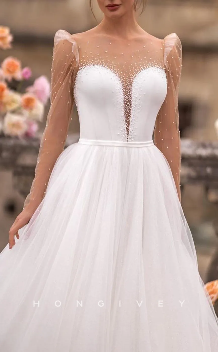 H1258 - Sexy Tulle A-Line Scoop Long Sleeve Empire Beaded With Train Wedding Dress